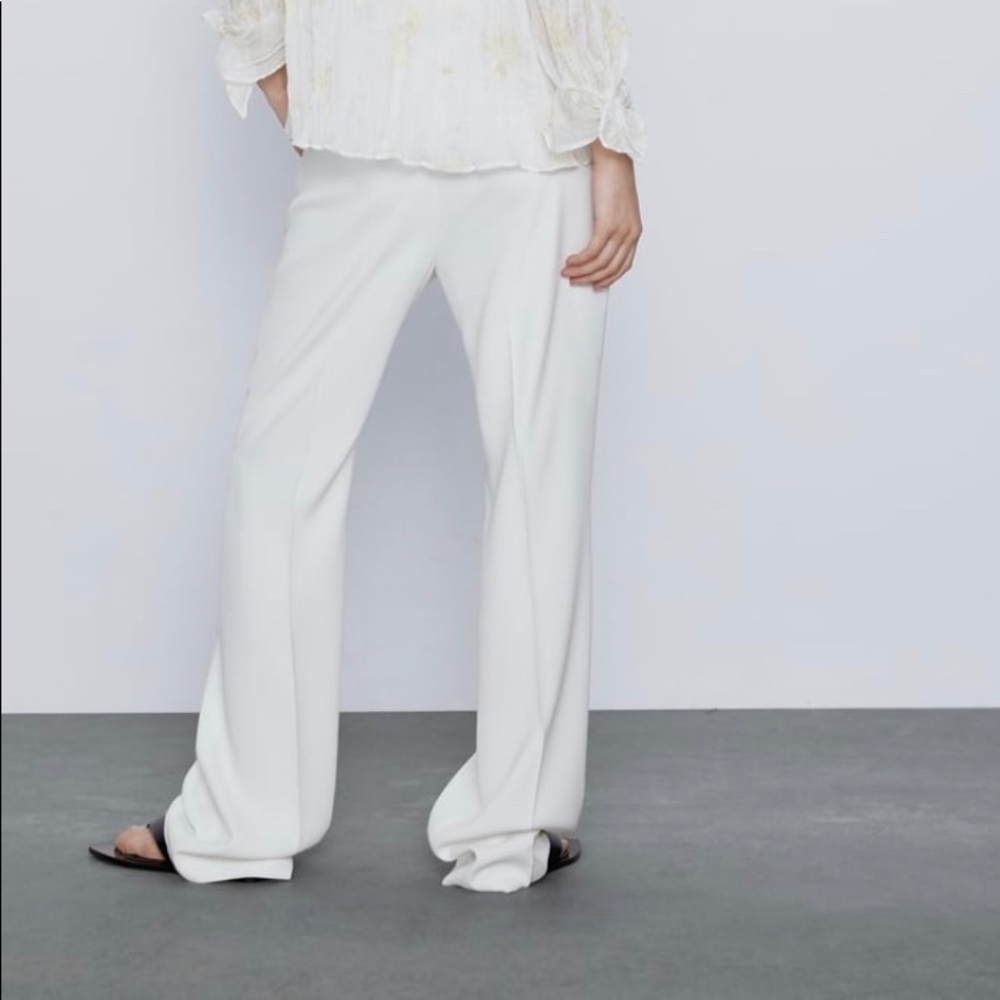 WHITE FLARED PANTS